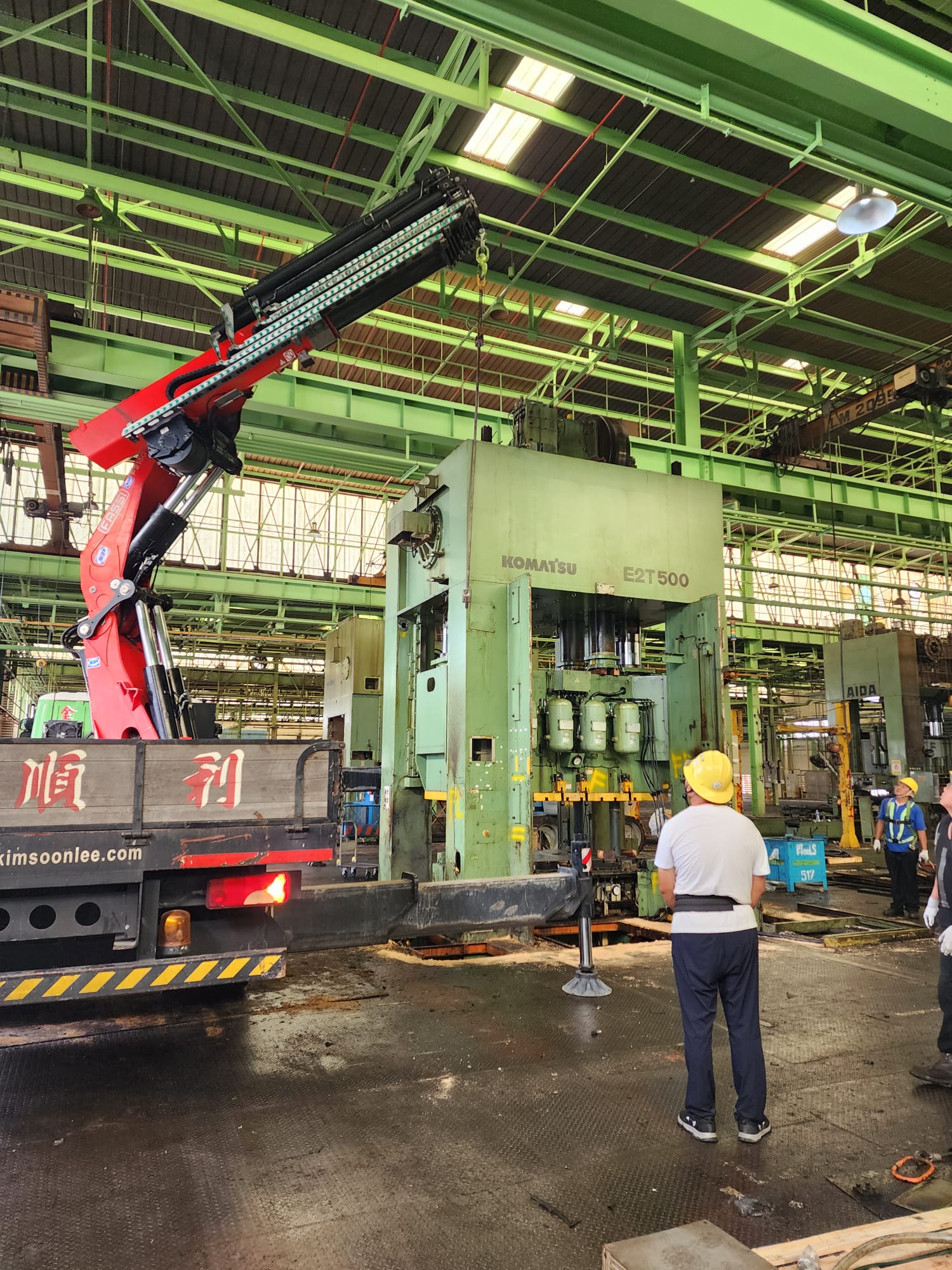 Industrial press dismantling in Singapore factory